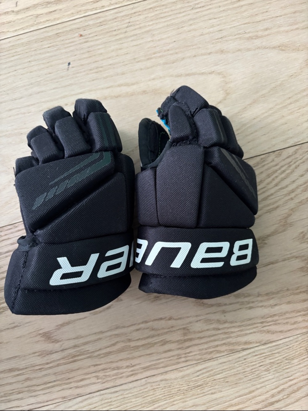 Bauer Black Youth Hockey Gloves with White Logo